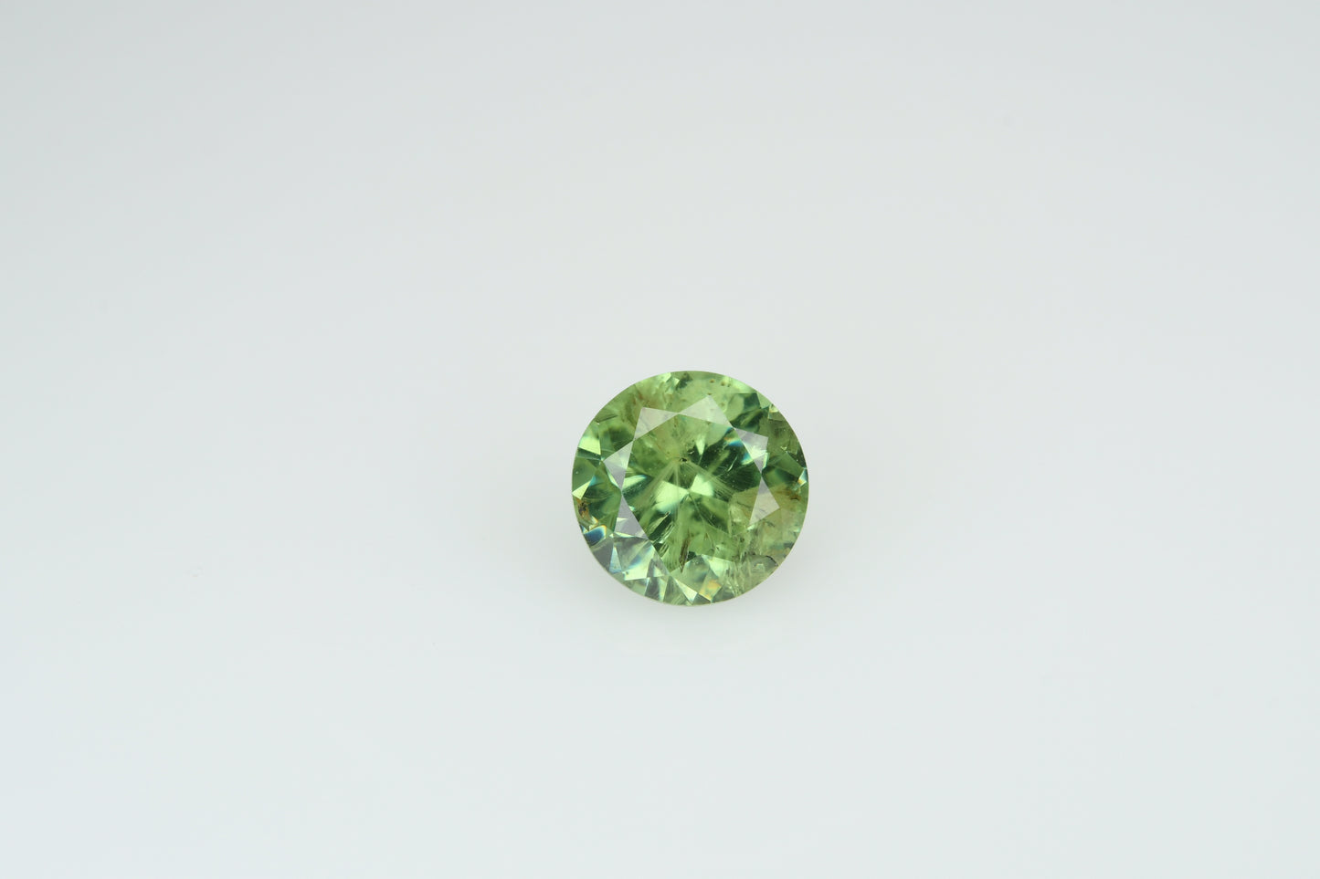 Faceted demantoid garnet 0.5 ct