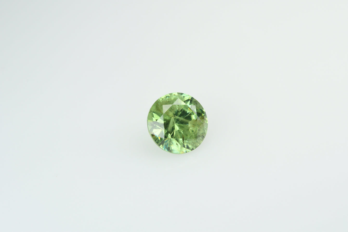 Faceted demantoid garnet 0.5 ct