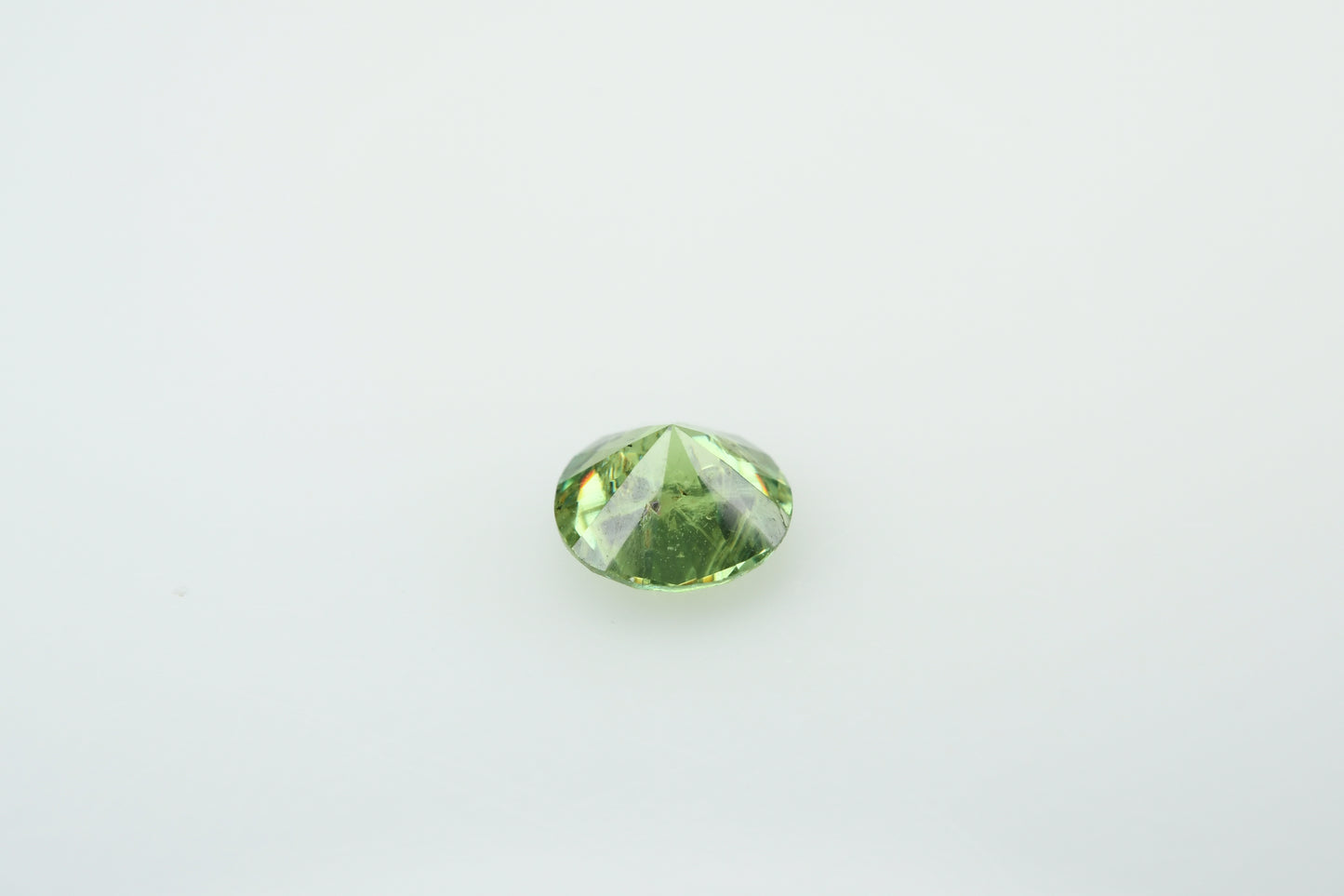 Faceted demantoid garnet 0.5 ct