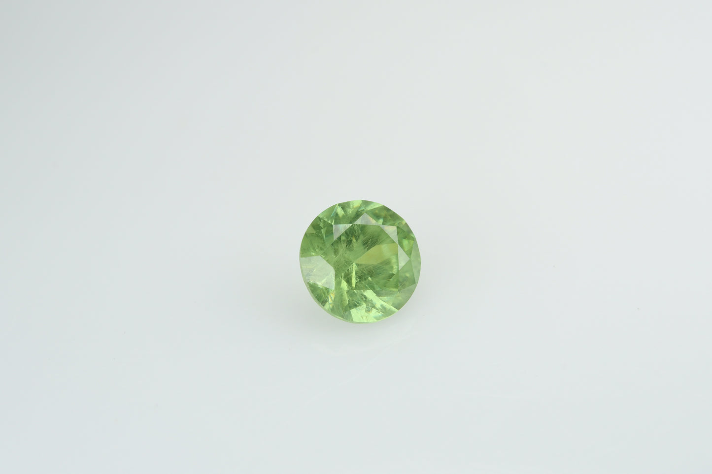 Faceted demantoid garnet 0.48 ct