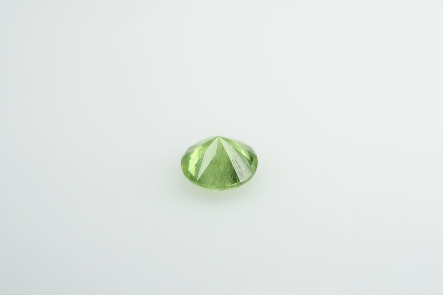 Faceted demantoid garnet 0.48 ct