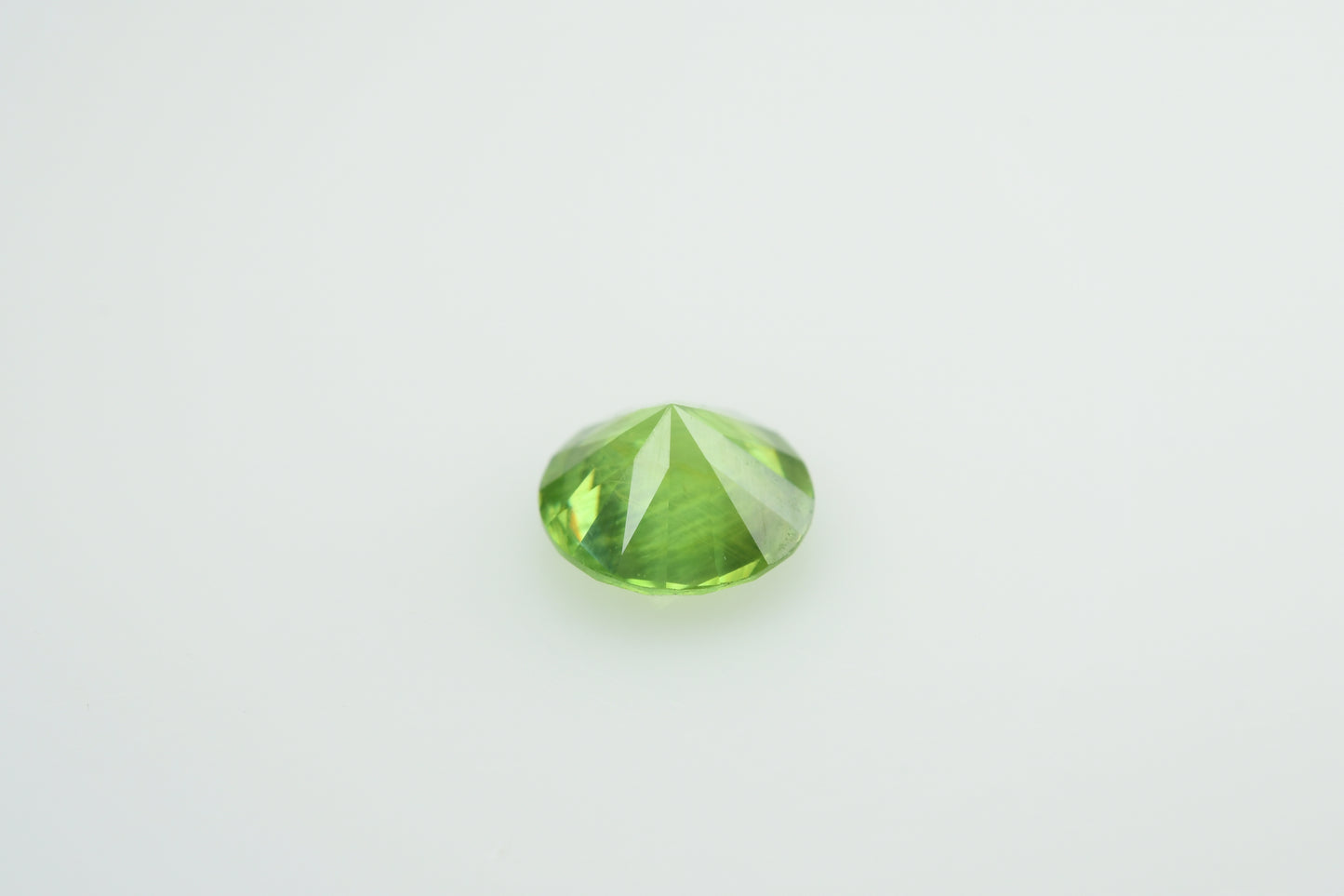 Faceted demantoid garnet 0.54 ct