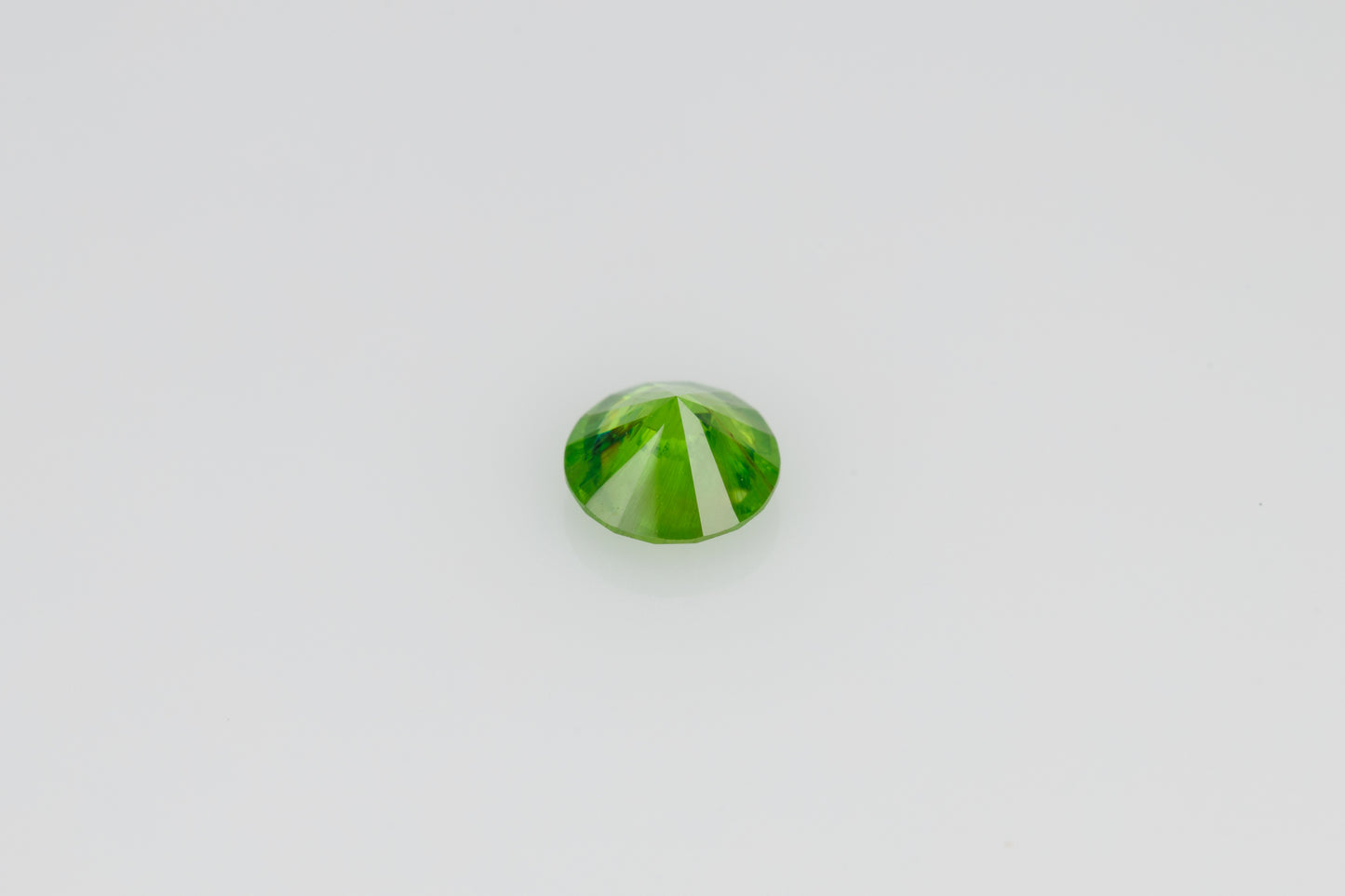 Faceted russian demantoid garnet 0.44 ct
