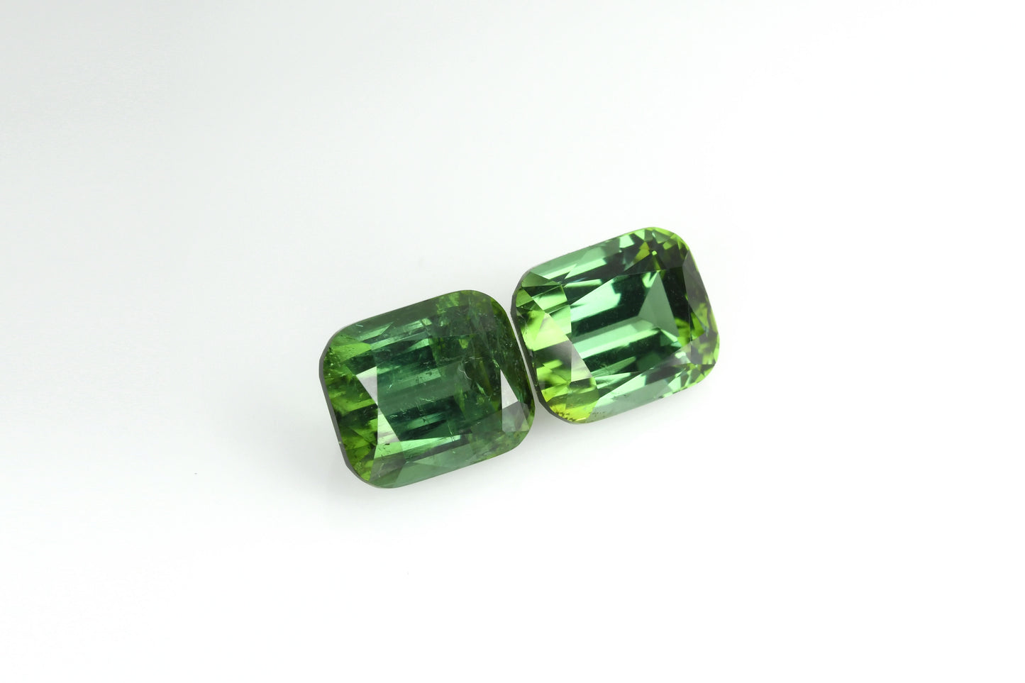 Faceted tourmaline pair, afghan green faceted tourmaline pair 9 ct