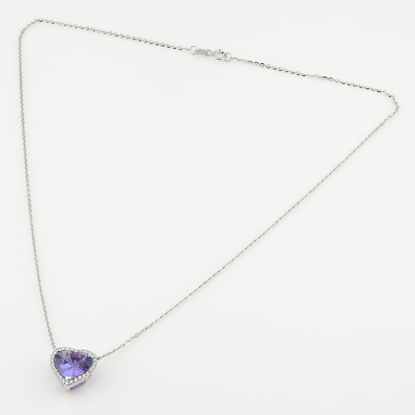 Faceted tanzanite heart golden necklace