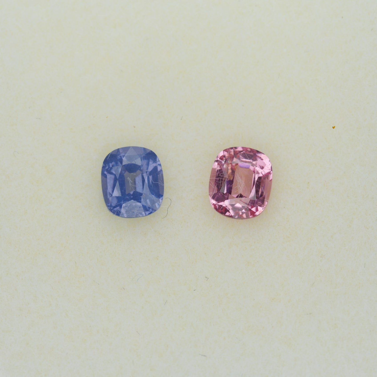Faceted spinel pair of different colors 0.97 carats