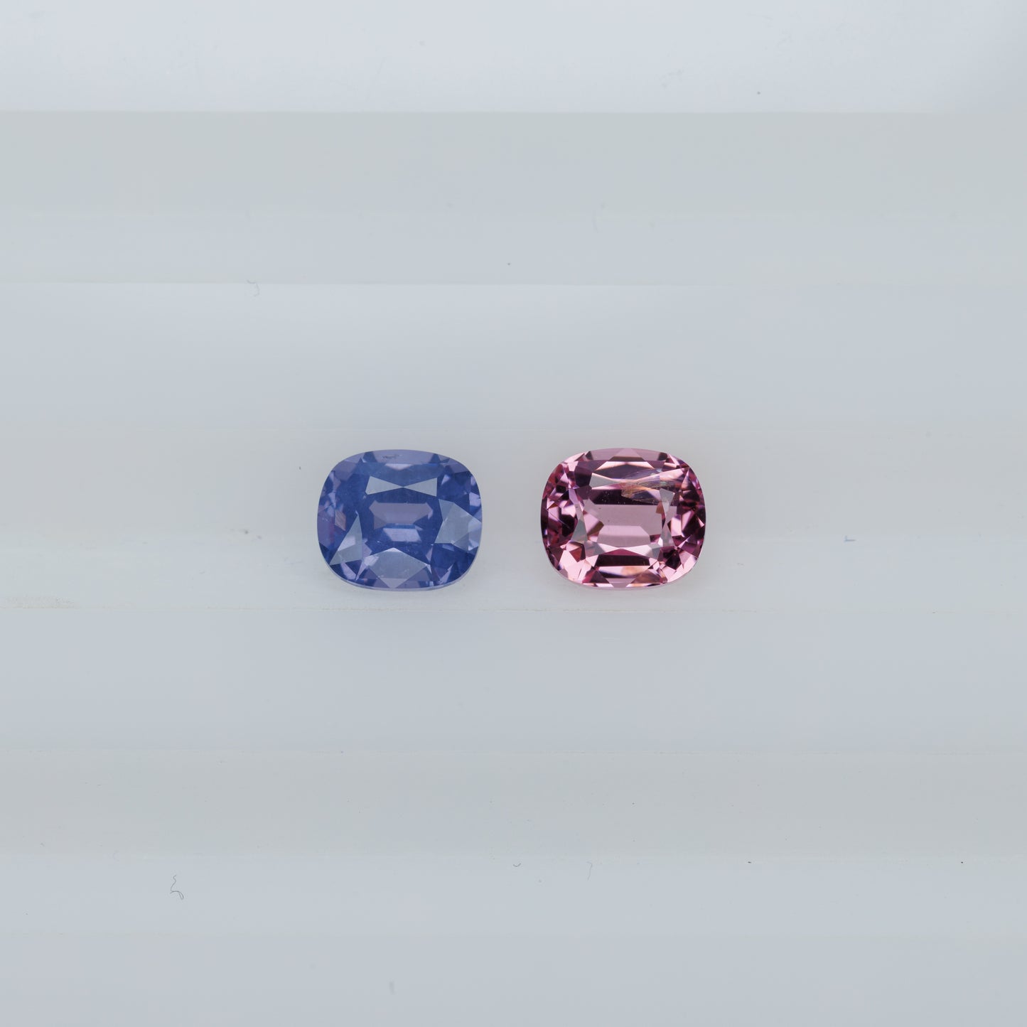 Faceted spinel pair of different colors 0.97 carats
