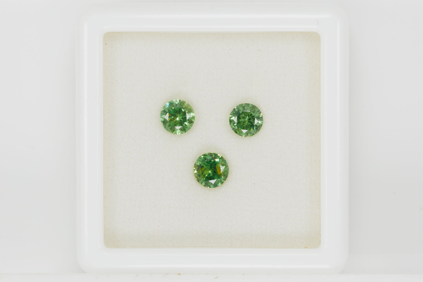 Faceted Russian demantoid pair set