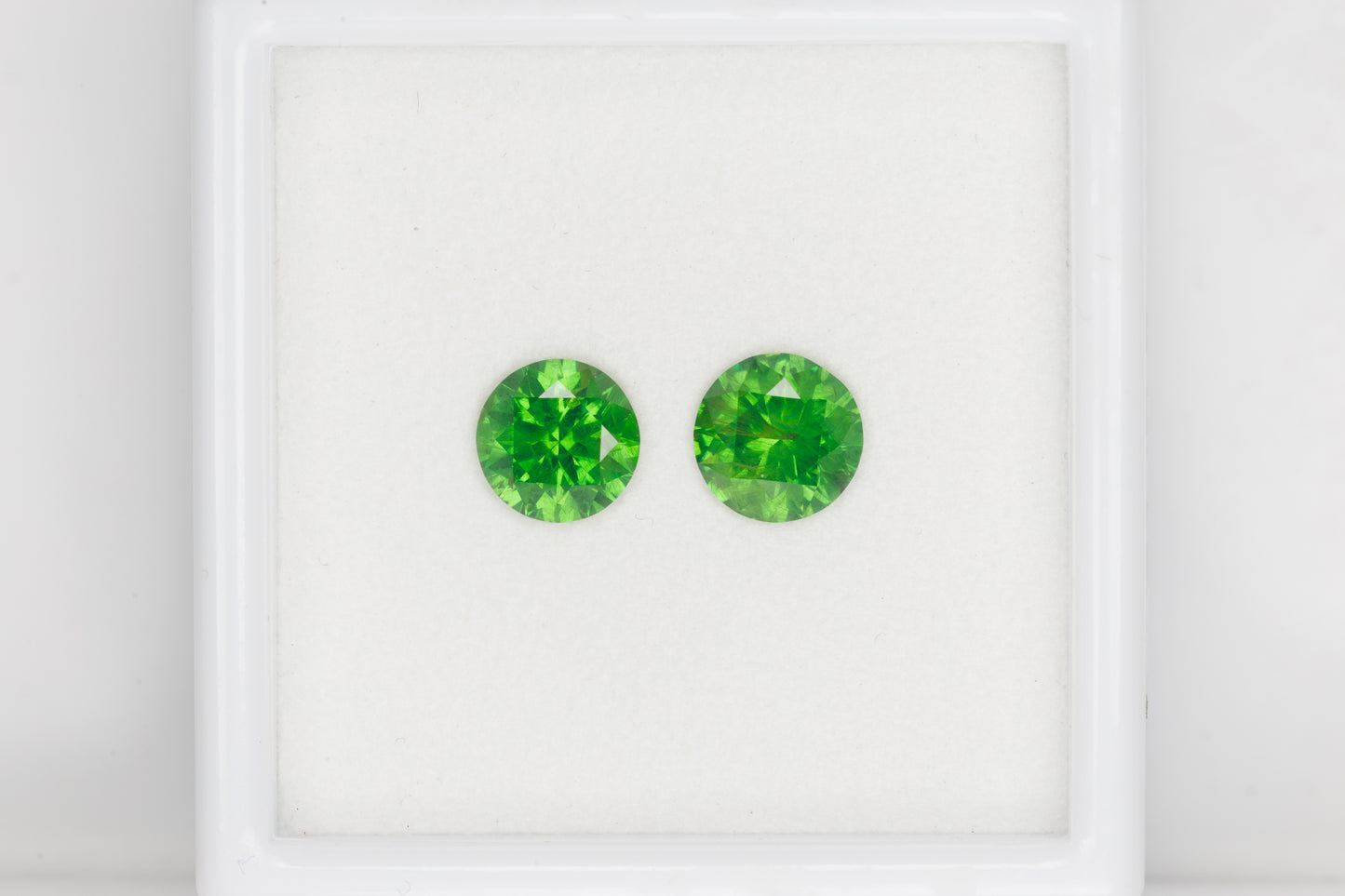 2.46 cts Certivied vivid green faceted Russian, demantoid pair