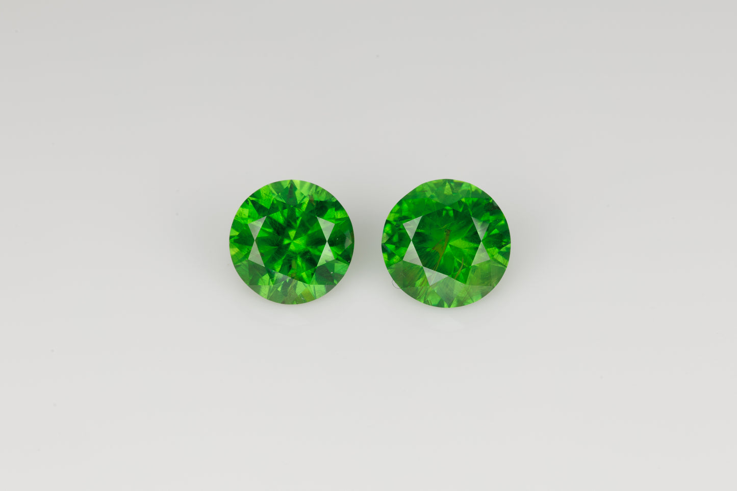 2.46 cts Certivied vivid green faceted Russian, demantoid pair
