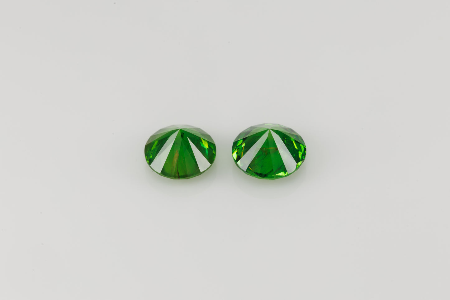 2.46 cts Certivied vivid green faceted Russian, demantoid pair