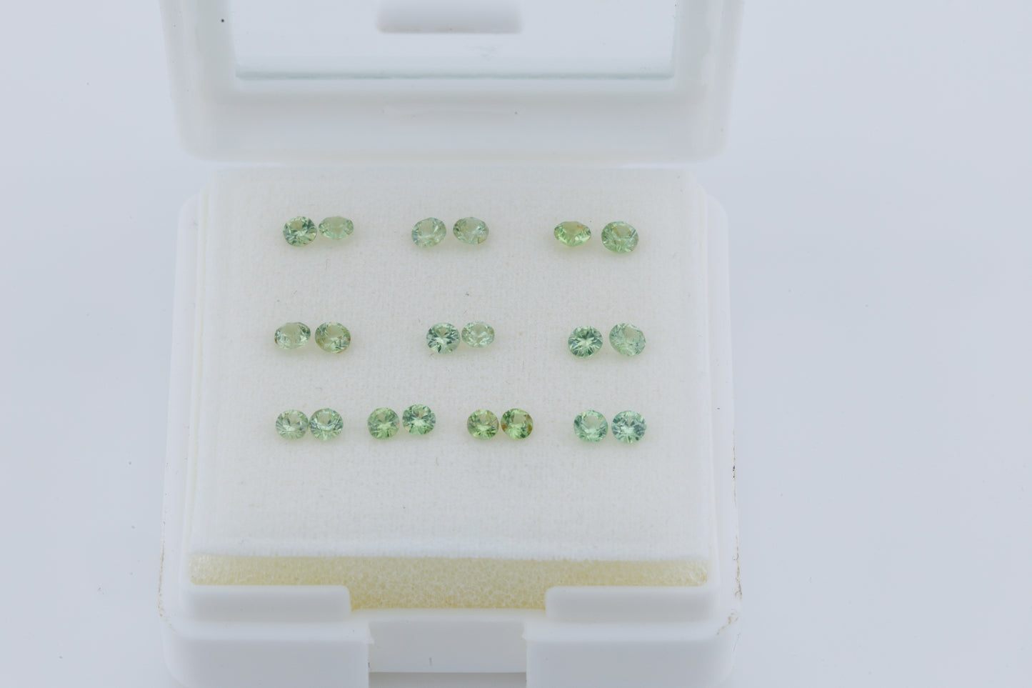Faceted Russian demantoid pairs set 1.3 cts