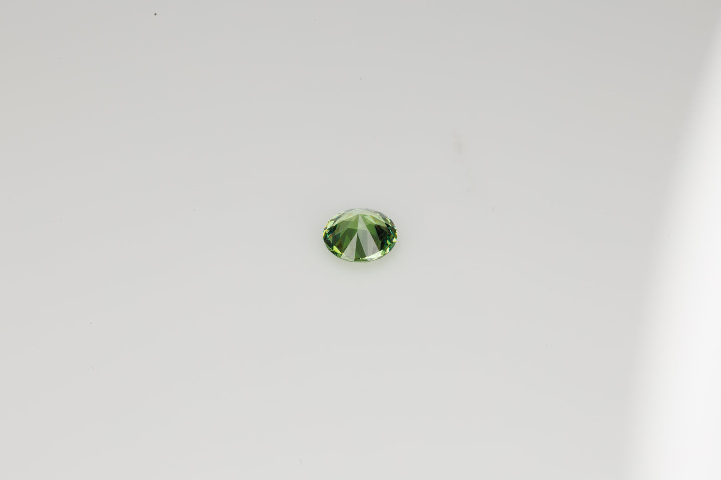 Faceted Russian demantoid garnet, 0.28 ct