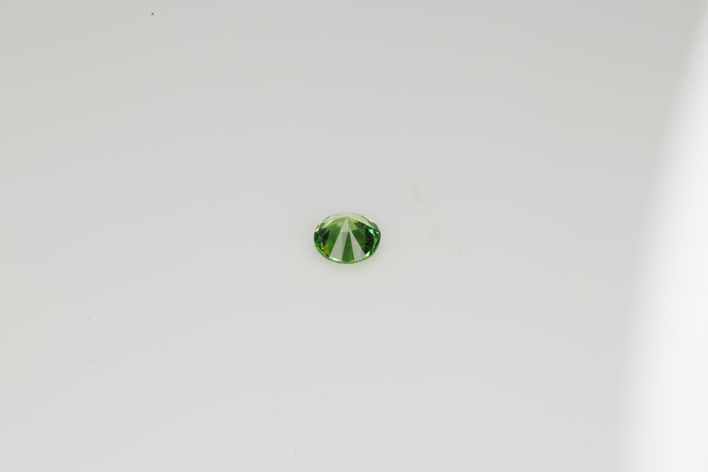Faceted Russian demantoid garnet, 0.24 ct