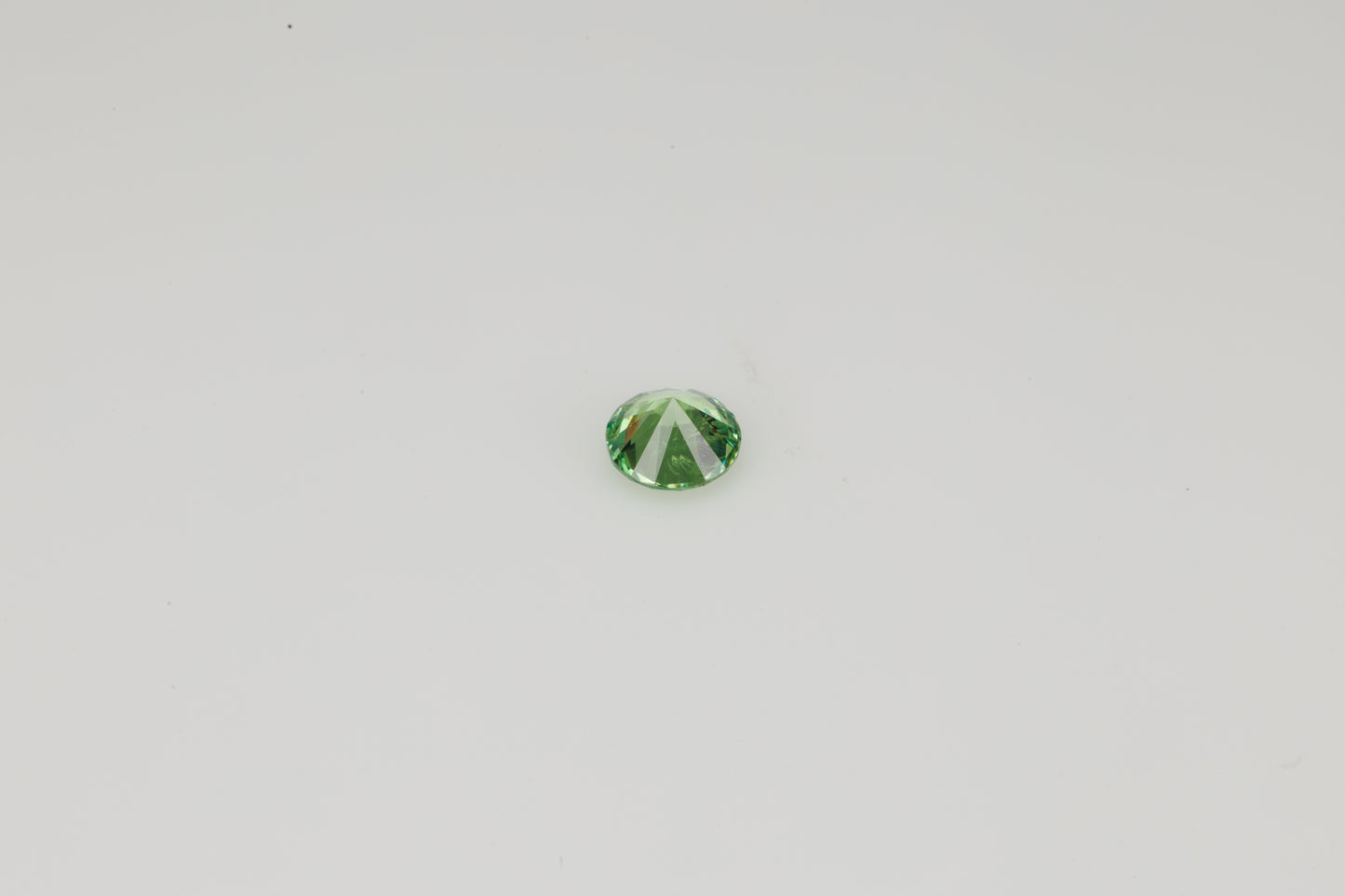 Faceted Russian demantoid garnet, 0.27 ct