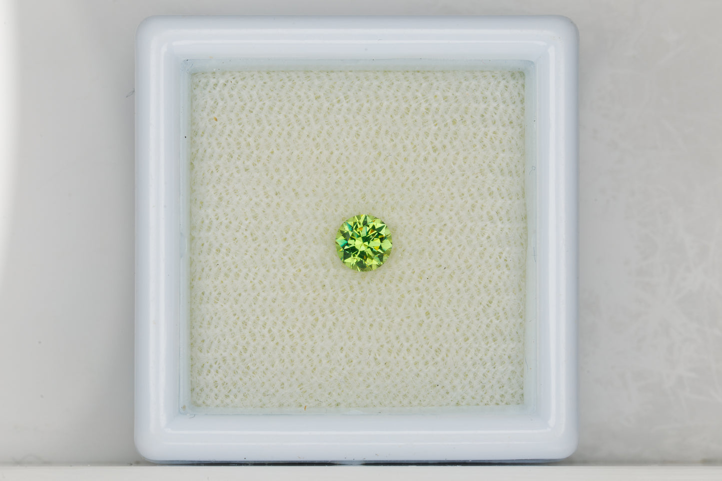 Faceted Russian demantoid garnet, 0.28 ct