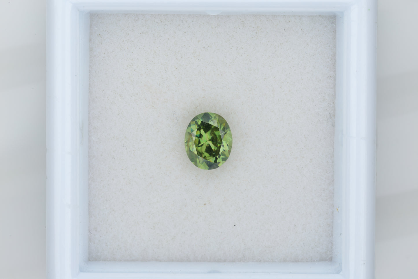 0.52 ct, oval demantoid garnet from Russia