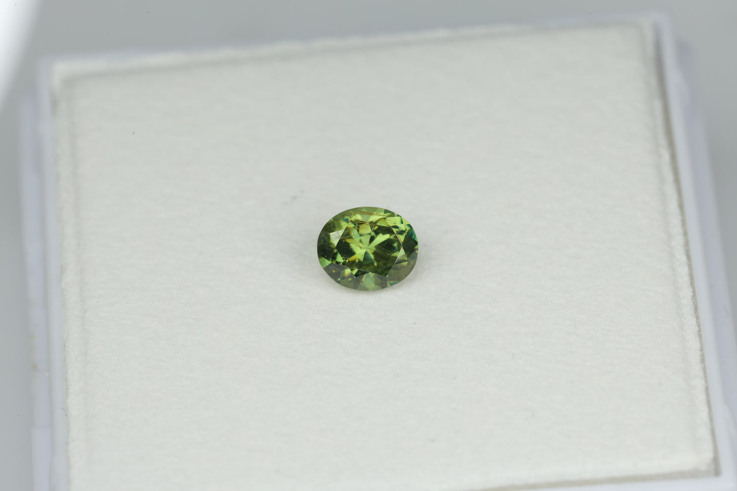 0.52 ct, oval demantoid garnet from Russia