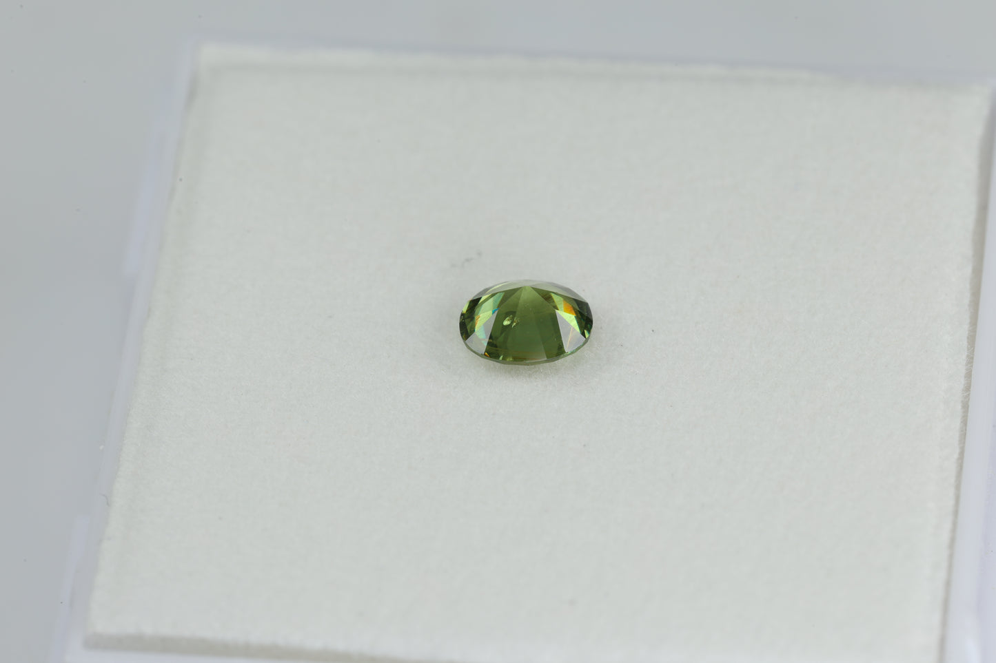 0.52 ct, oval demantoid garnet from Russia