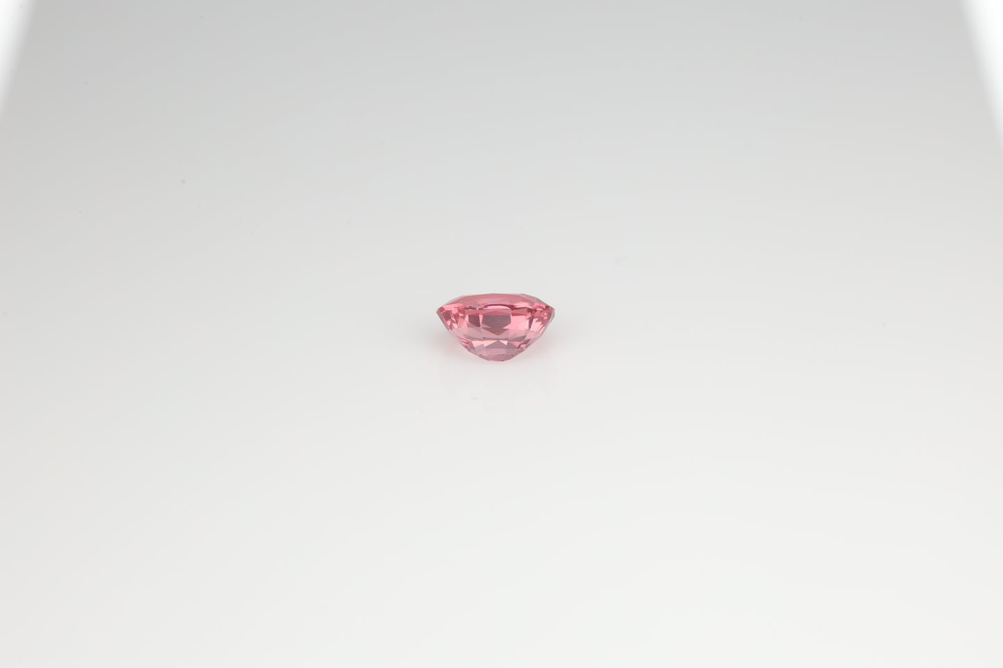 Rare sunset color faceted oval spinel, 1.25 cts