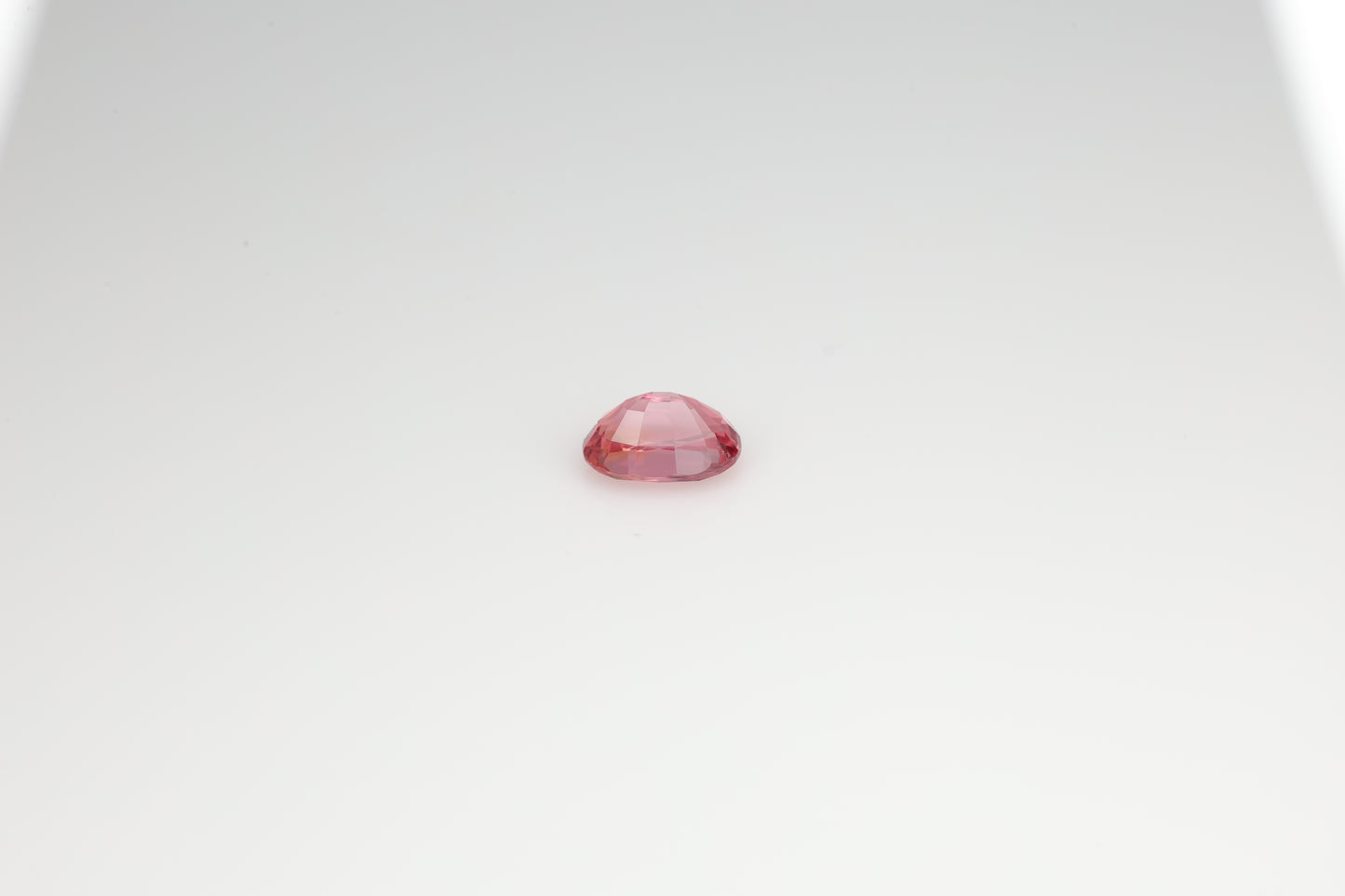 Rare sunset color faceted oval spinel, 1.25 cts