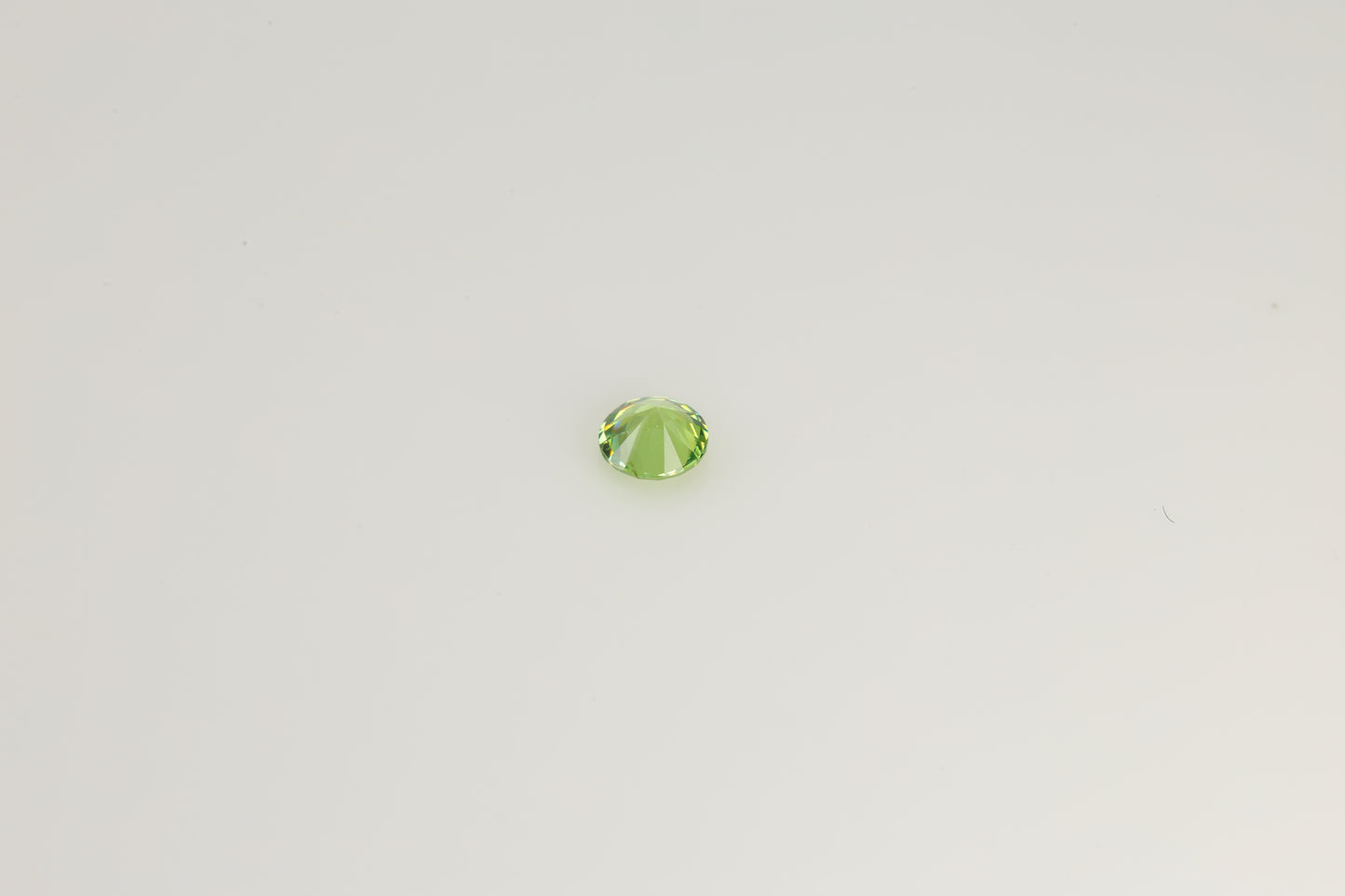 0.24 ct Faceted Russian demantoid garnet