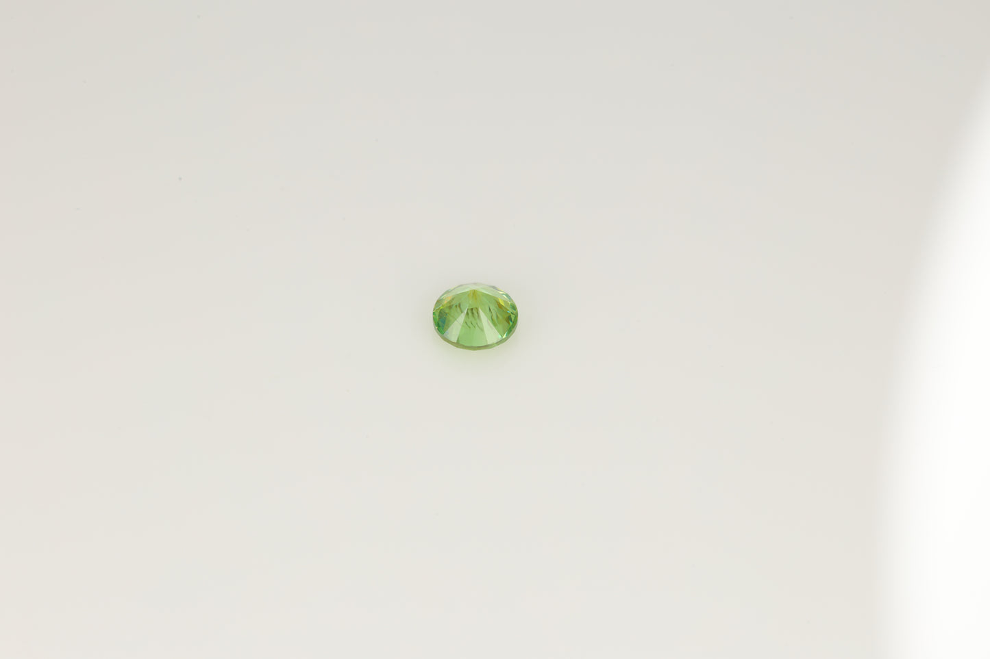 0.32 ct Faceted Russian demantoid garnet