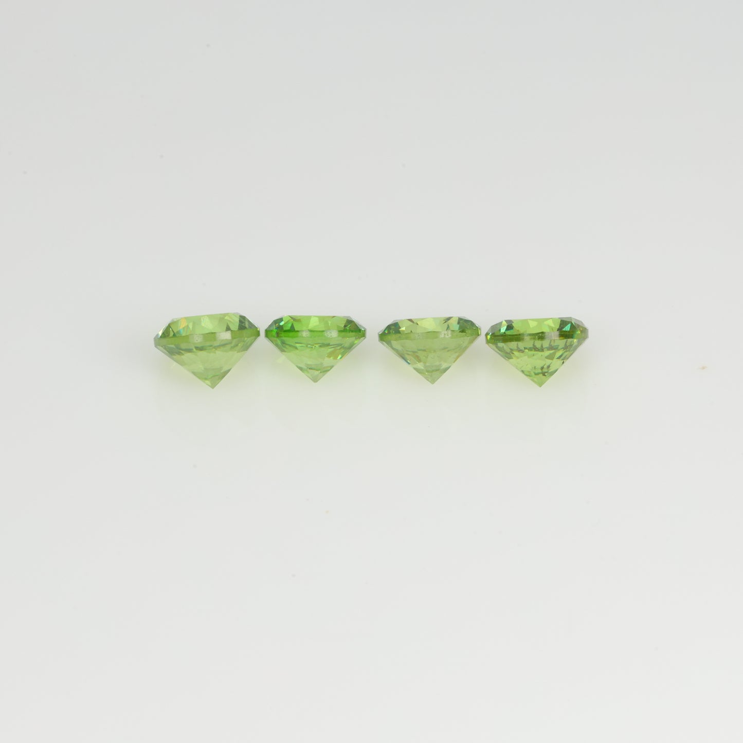 0.93 ct, Faceted demantoid set
