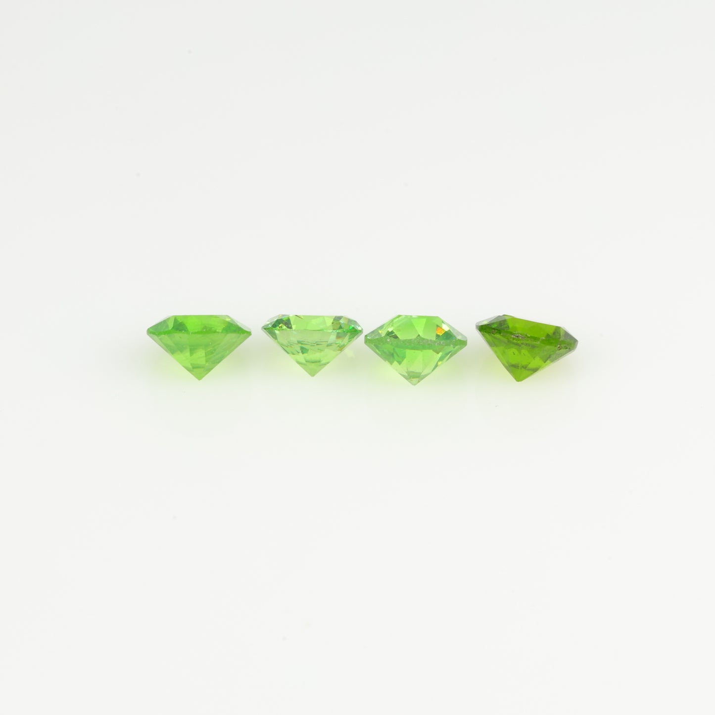 0.57 ct, demantoid garnet set
