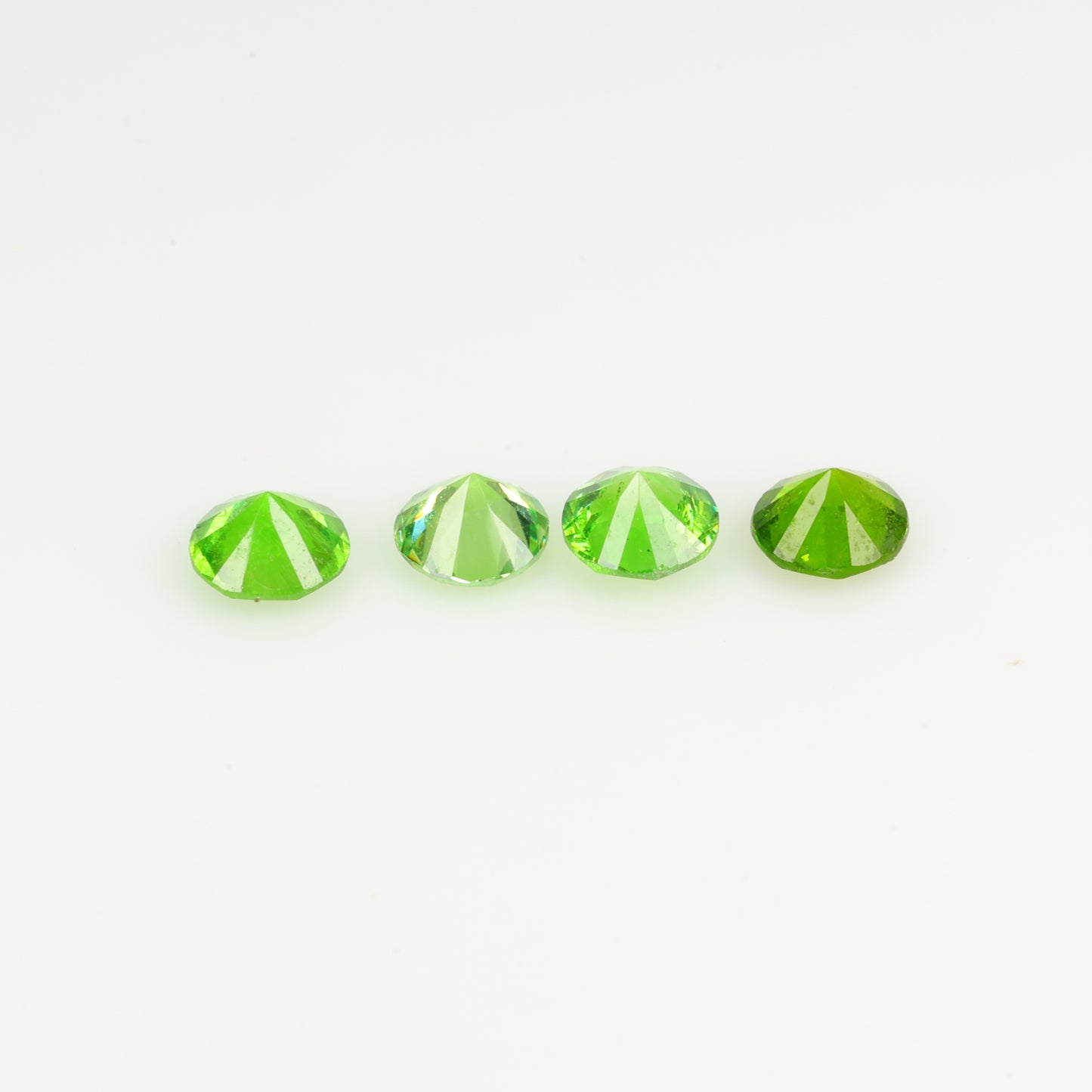 0.57 ct, demantoid garnet set