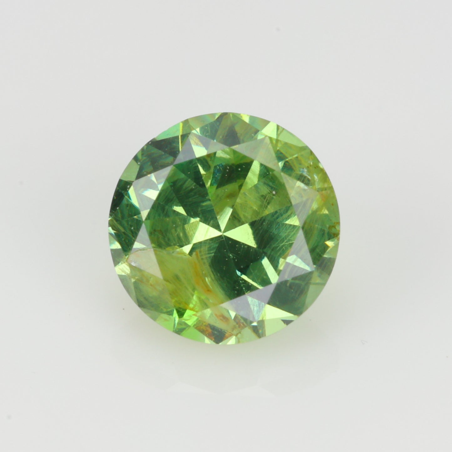 0.48 ct, Faceted Russian demantoid garnet