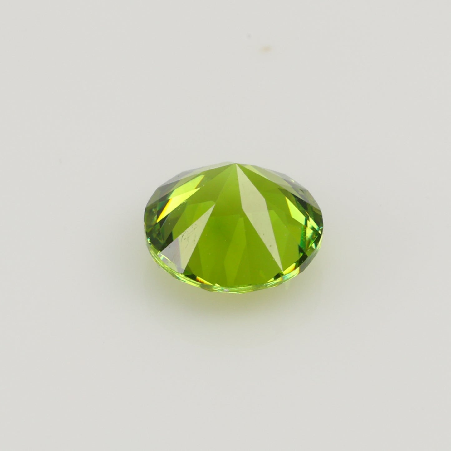 0.45 ct, Faceted Russian demantoid garnet high dispersion