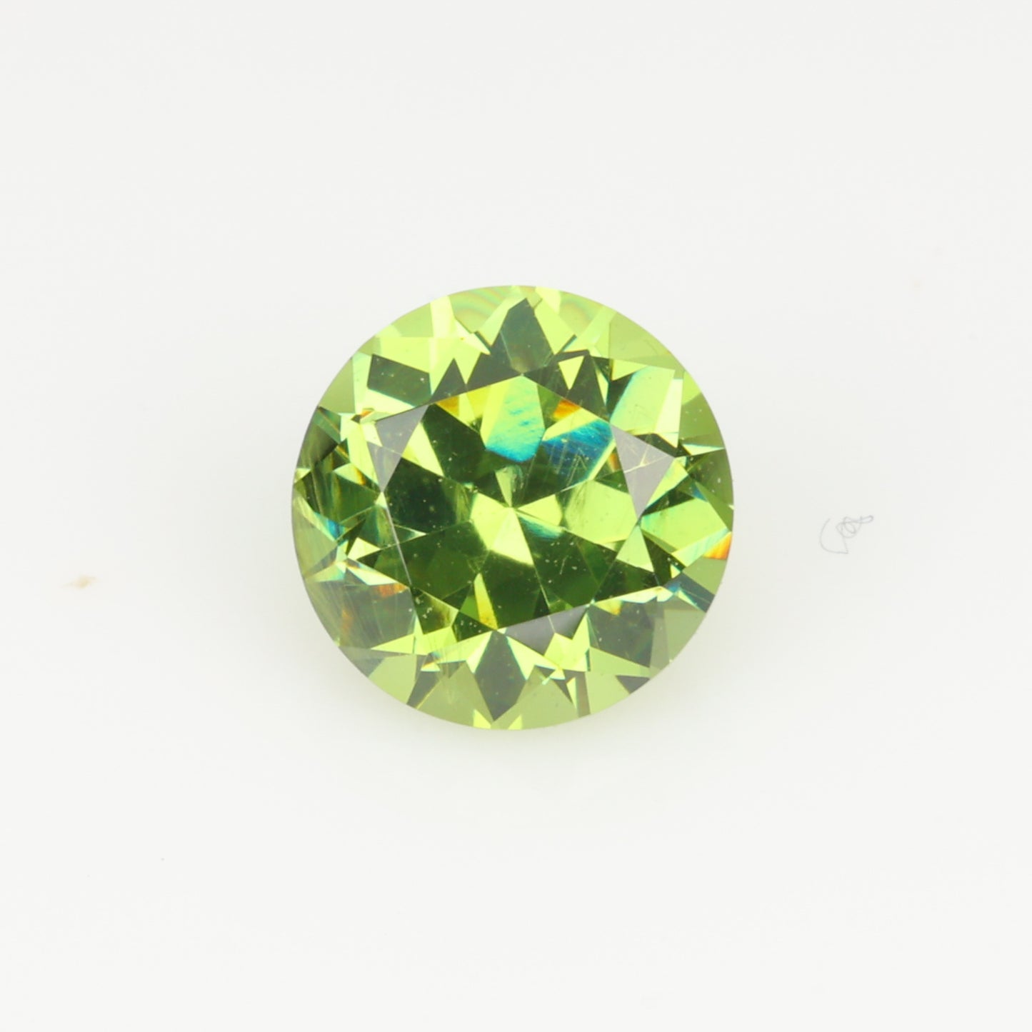 0.39 ct, Faceted Russian demantoid garnet, high dispersion