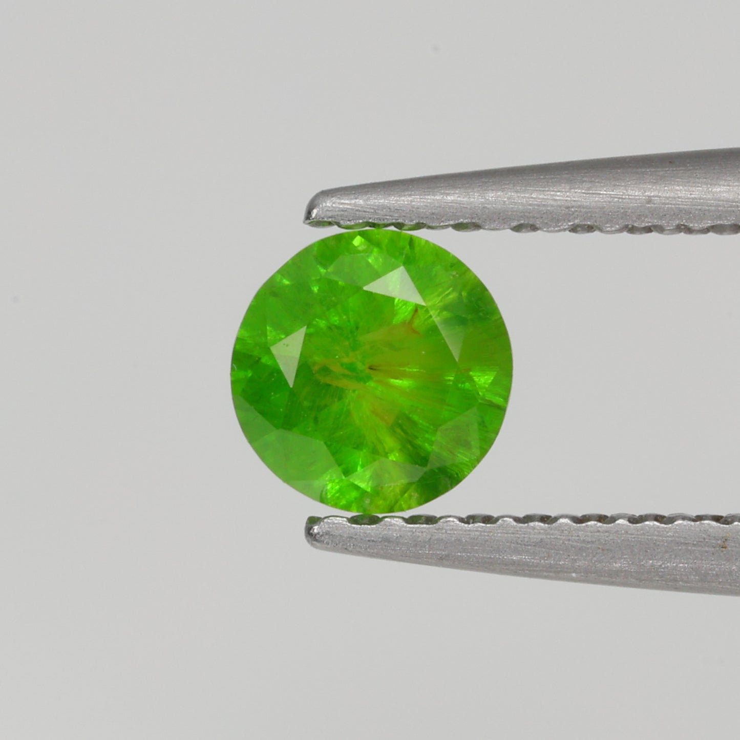 0.32 ct, Faceted Russian demantoid green garnet