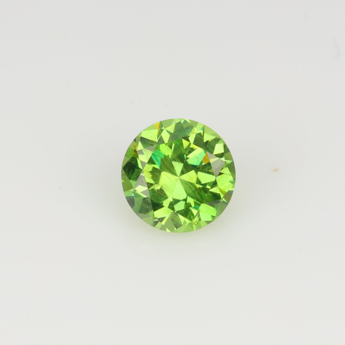 0.27 ct, Faceted Russian demantoid garnet high dispersion