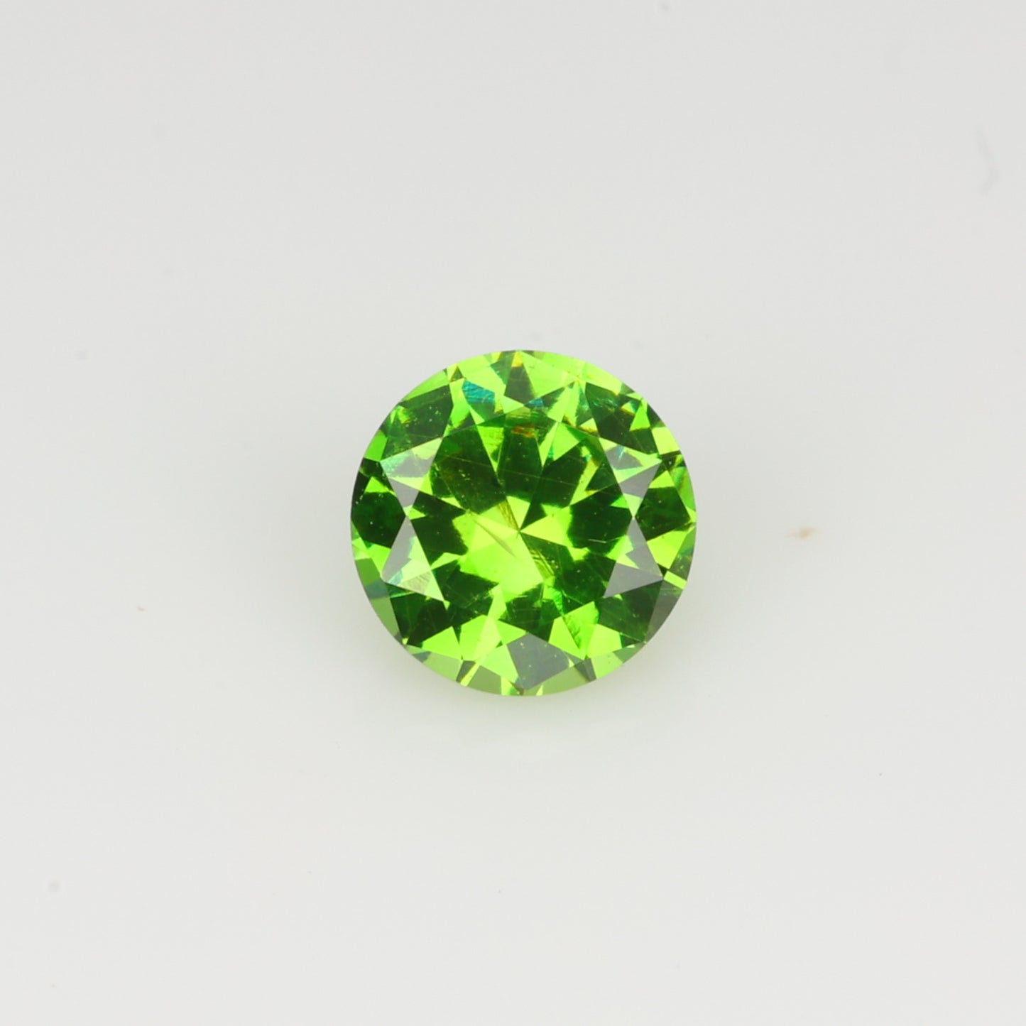 0.24 ct, Faceted Russian demantoid garnet high dispersion