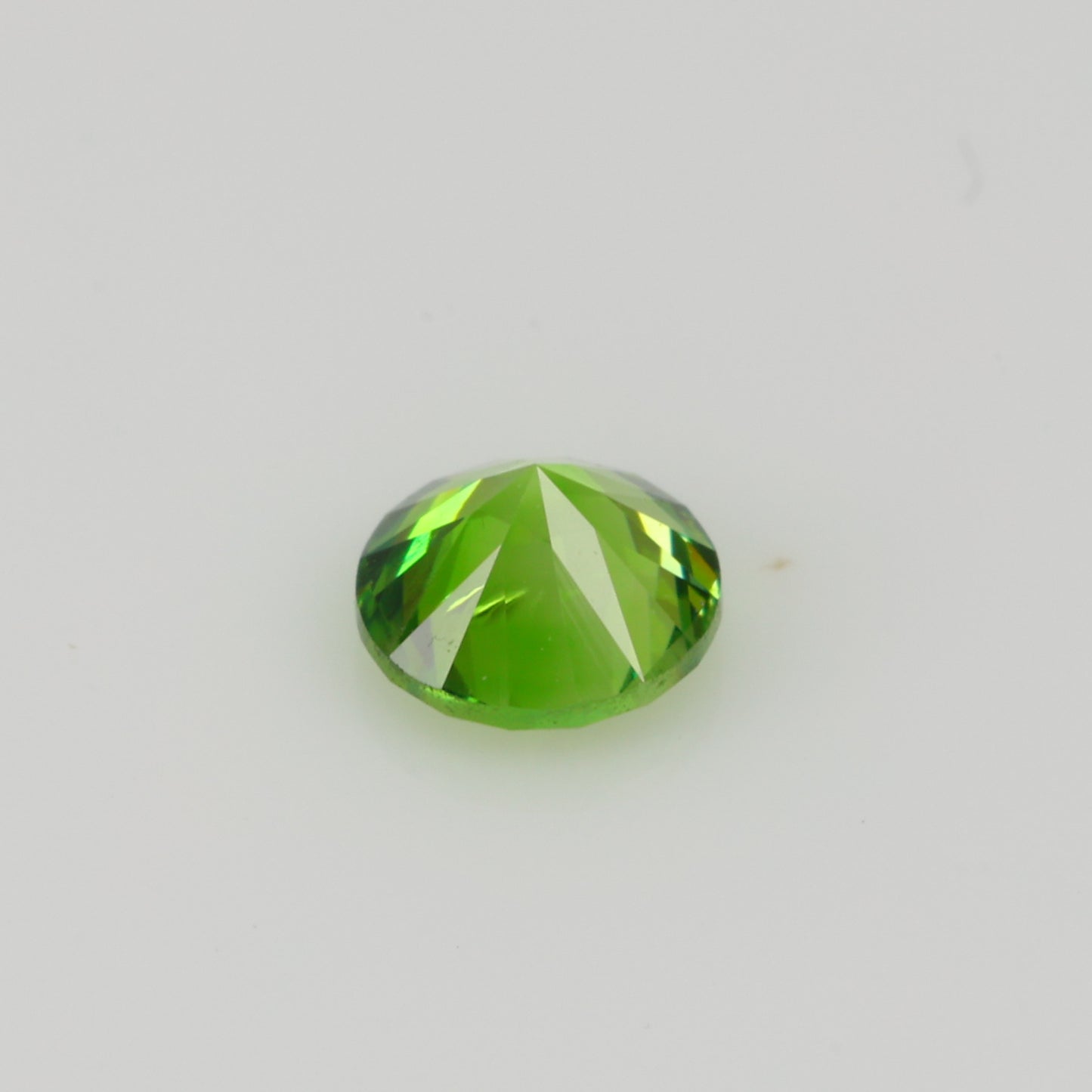 0.24 ct, Faceted Russian demantoid garnet high dispersion