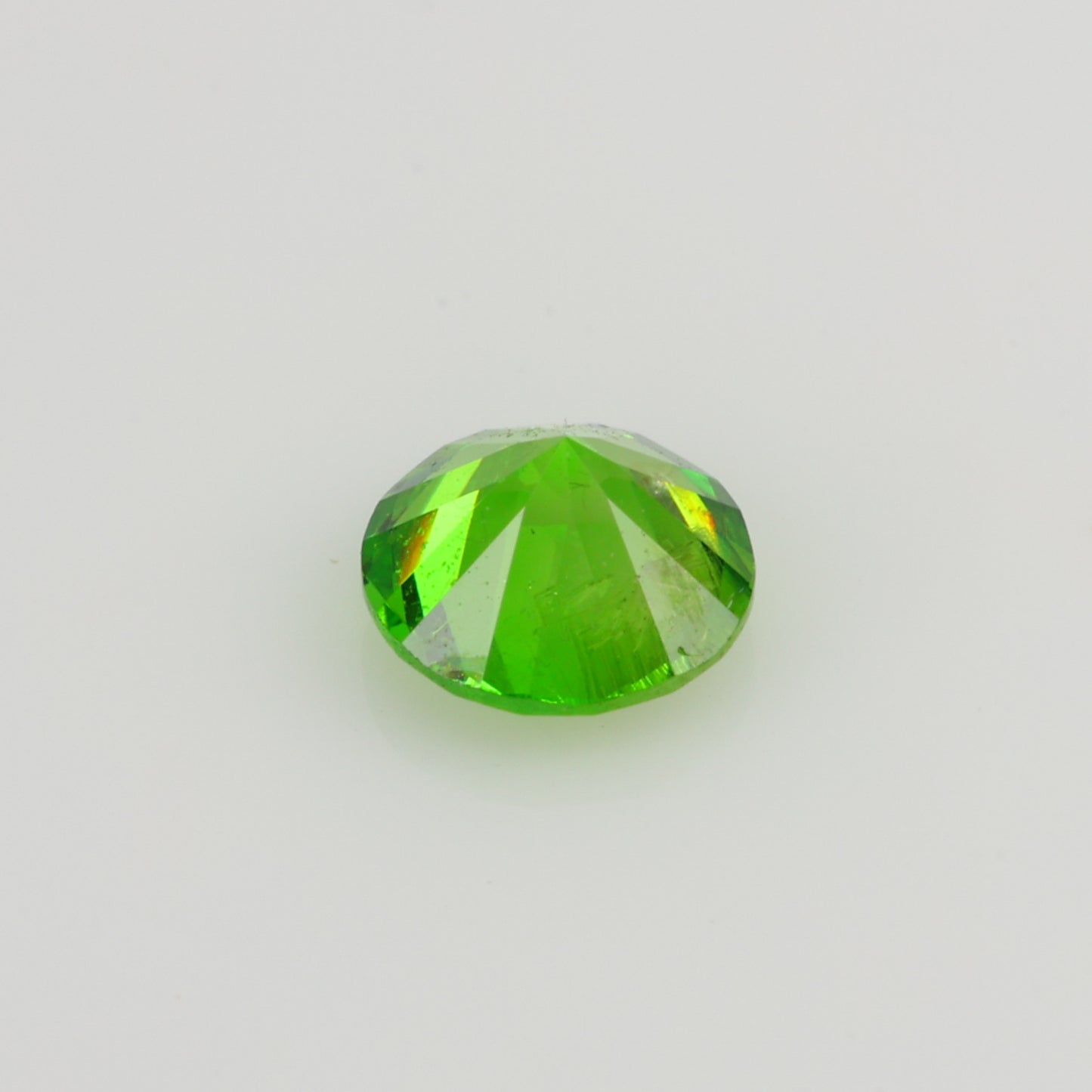 0.22 ct, Faceted Russian demantoid garnet high dispersion