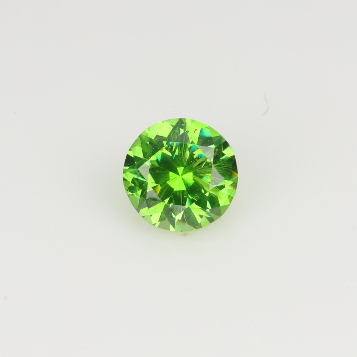 0.22 ct, Faceted Russian demantoid garnet high dispersion