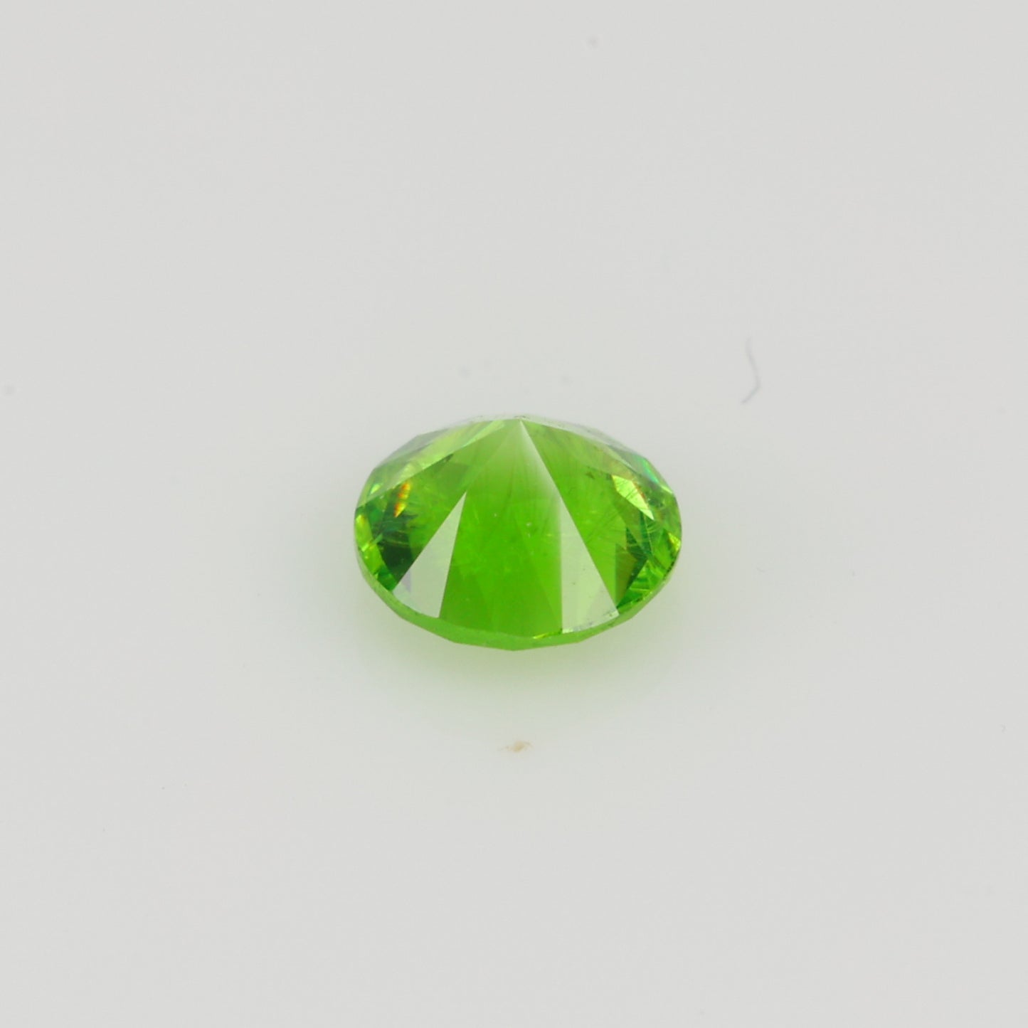 0.22 ct, Faceted Russian demantoid garnet high dispersion