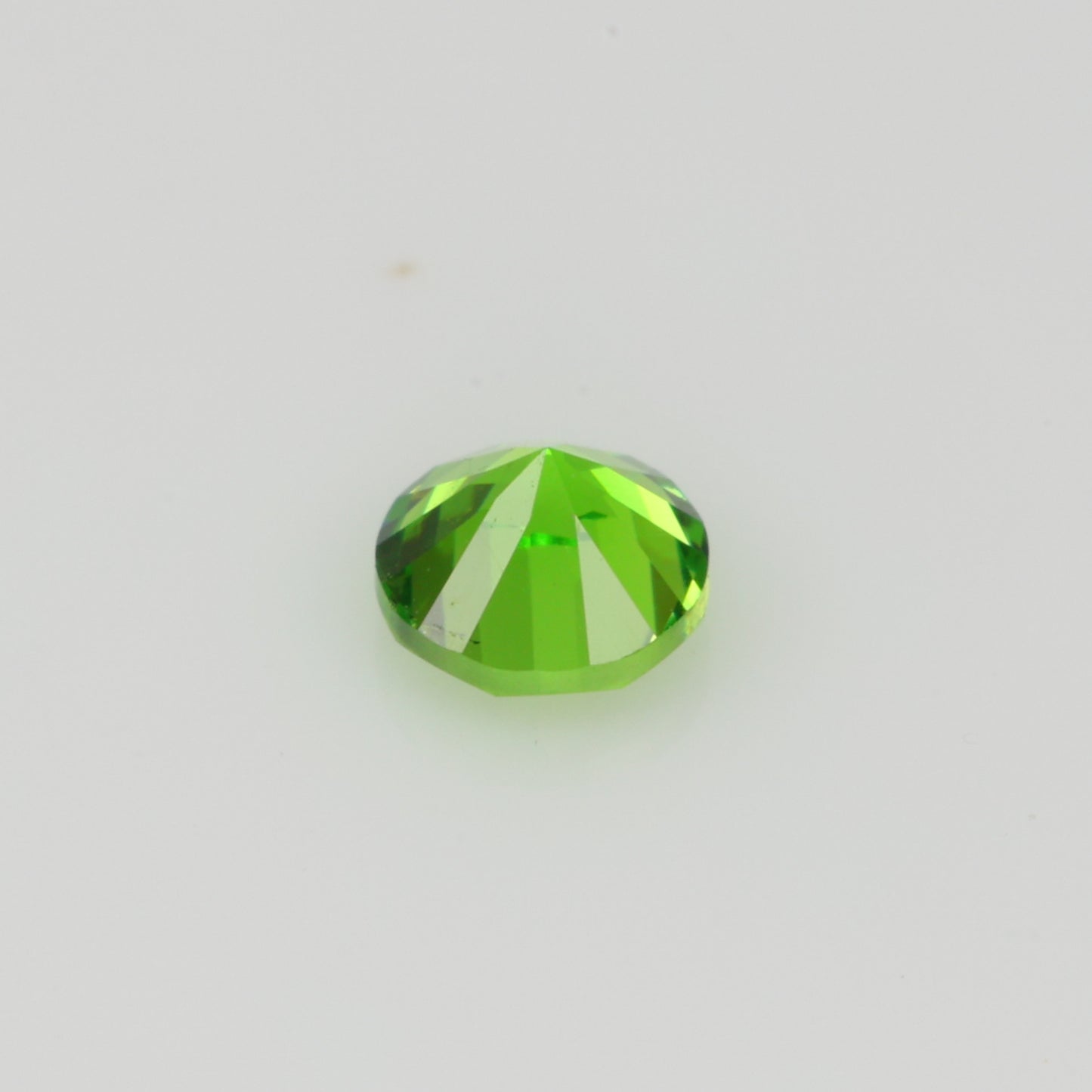 0.14 ct, Faceted Russian demantoid garnet high dispersion