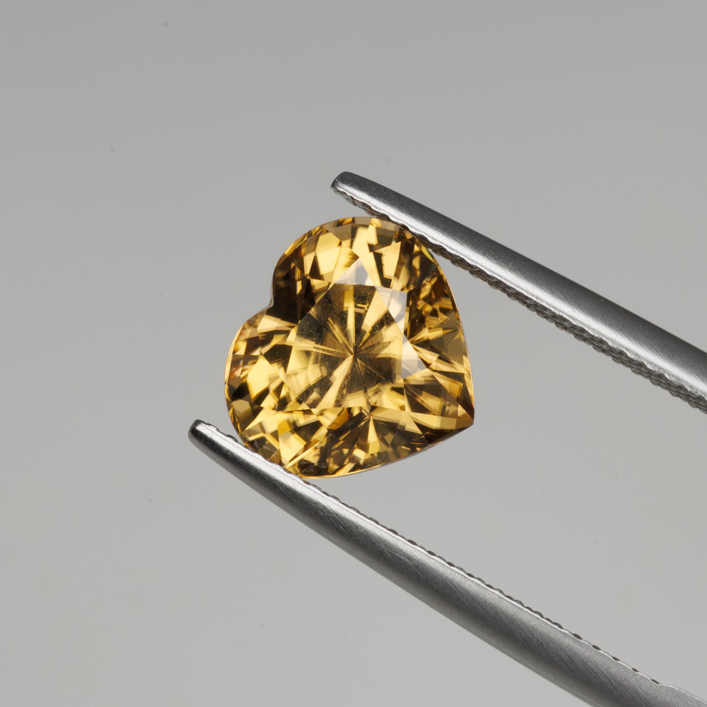 6.05 cts, Facted yellow zircon heart shape, perfect cut