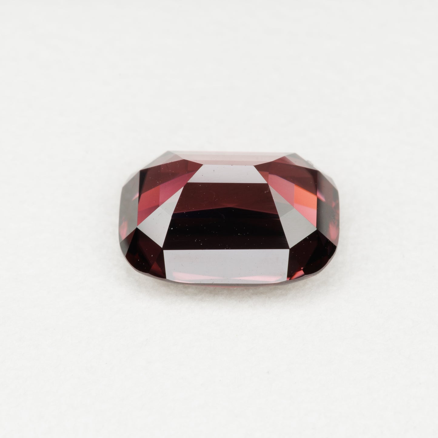 5.78 cts, Faceted red zircon, cushion cut