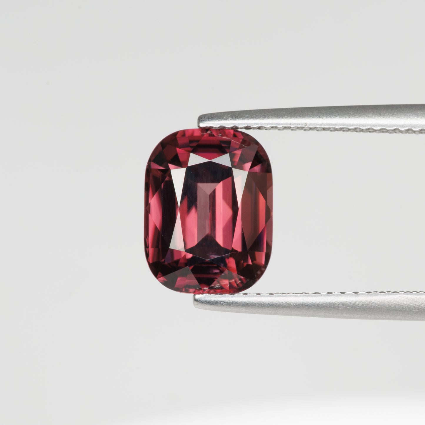 5.78 cts, Faceted red zircon, cushion cut