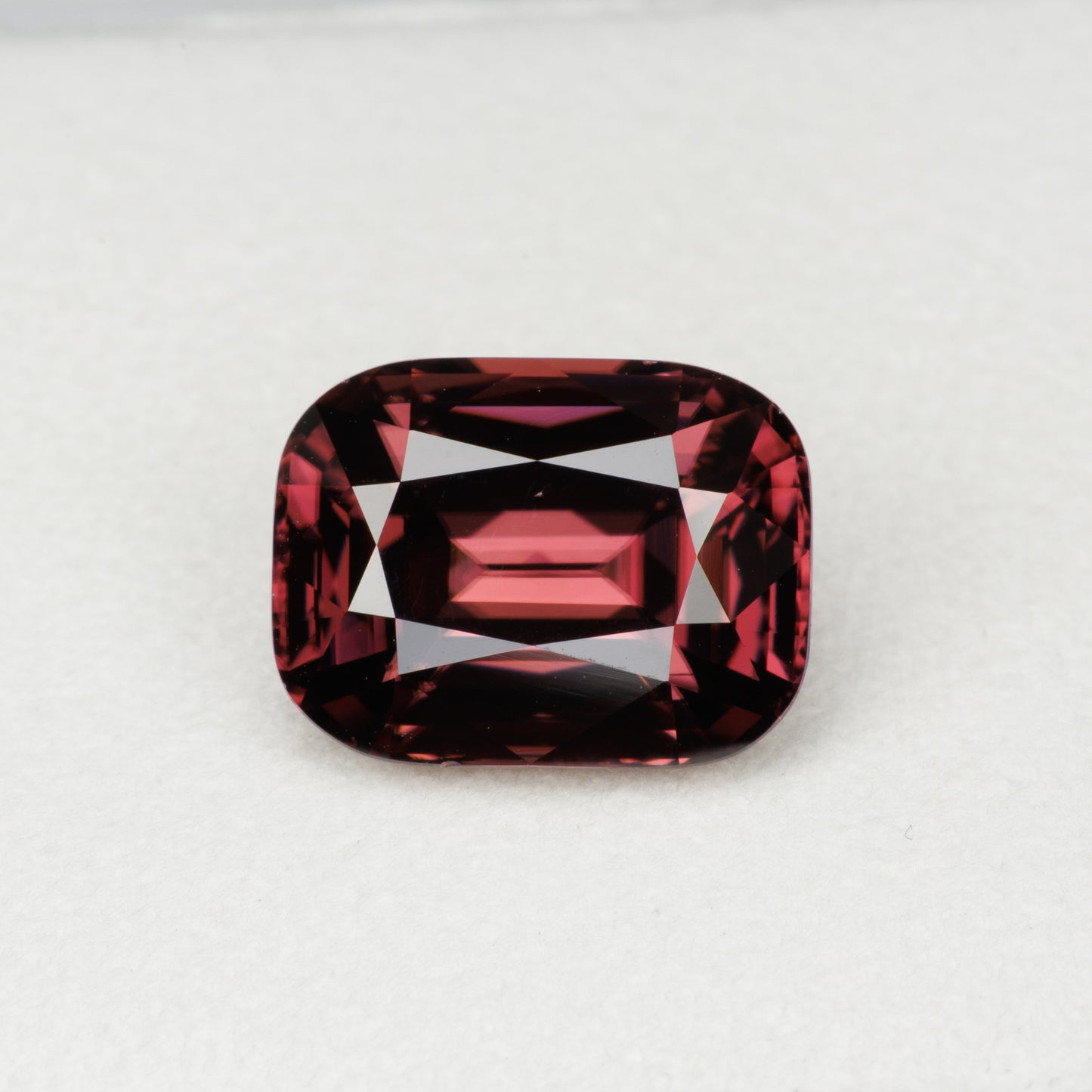 5.82 cts, Faceted red zircon, cushion cut