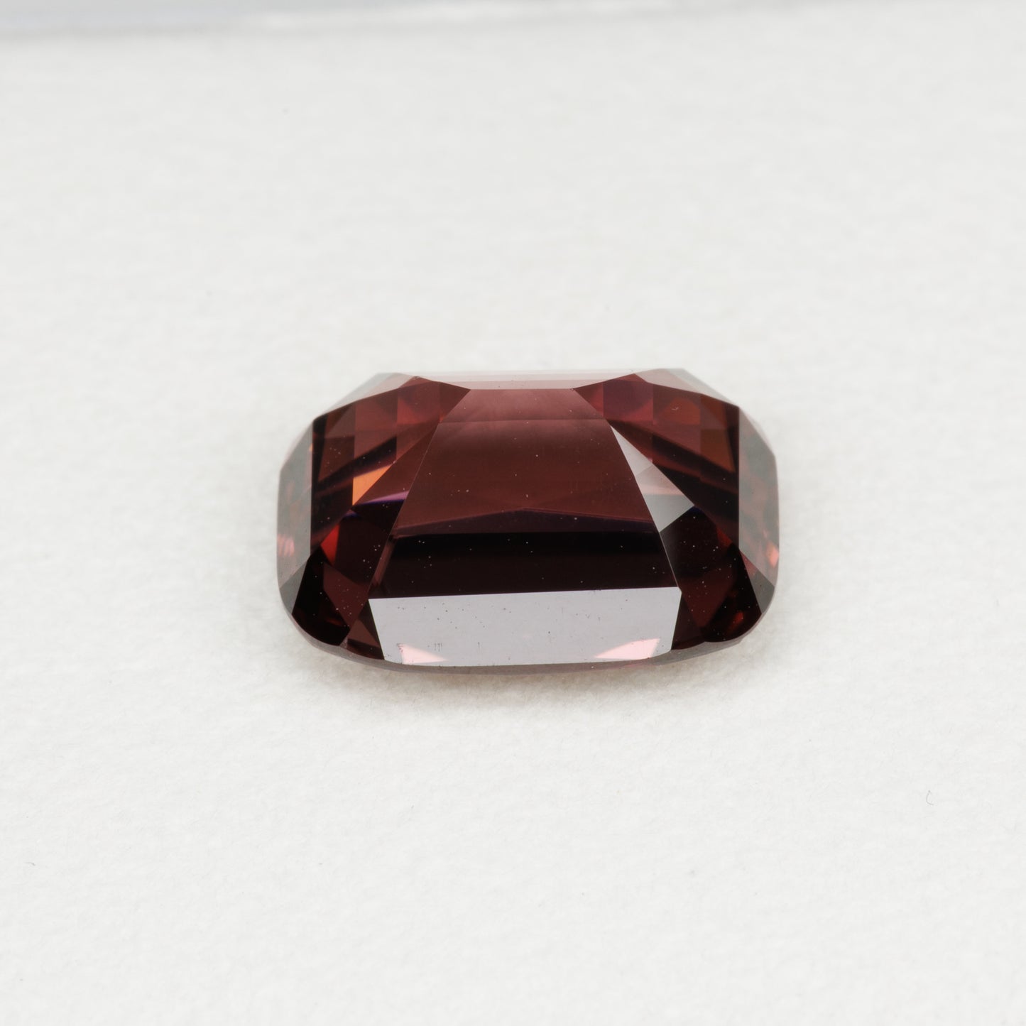 5.82 cts, Faceted red zircon, cushion cut