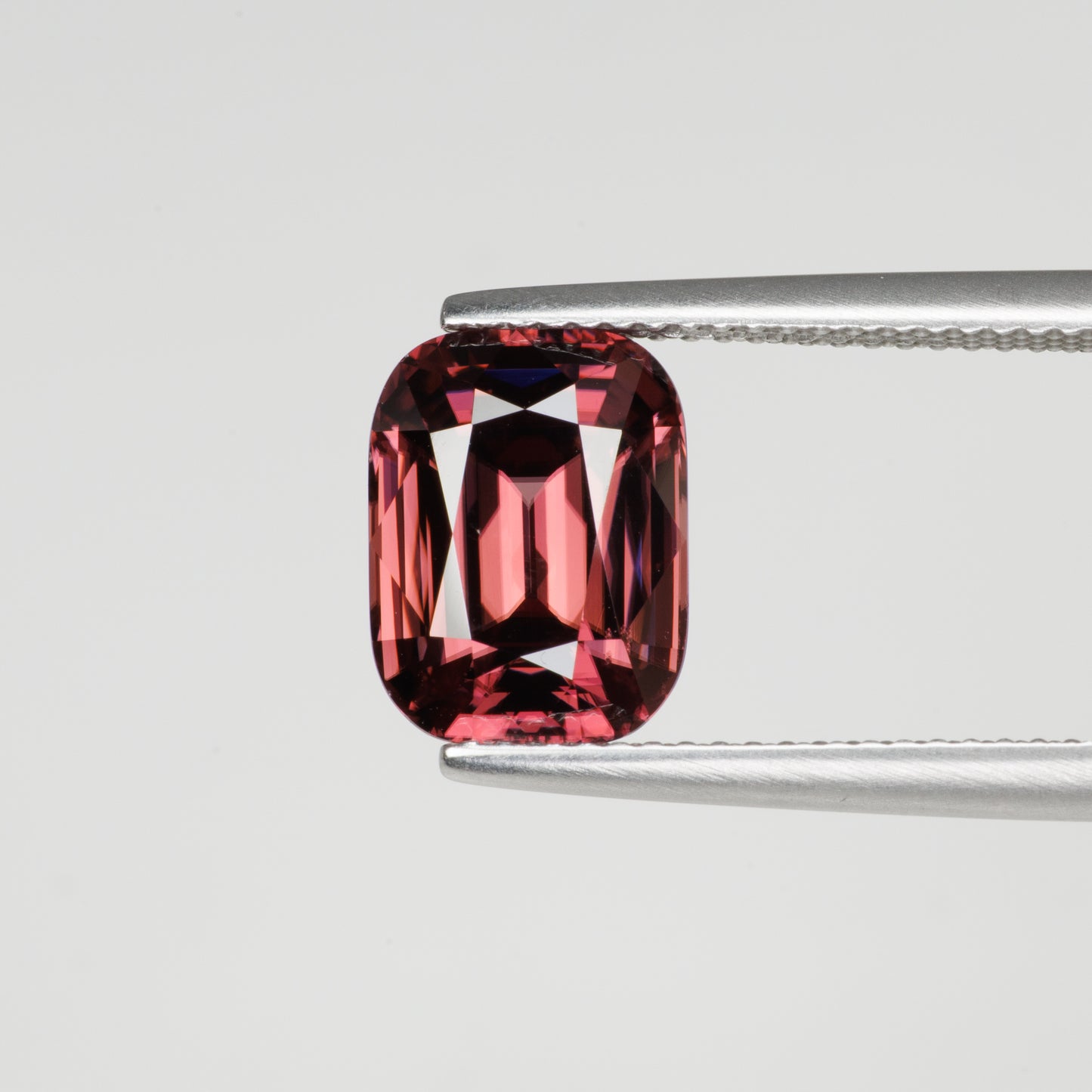 5.82 cts, Faceted red zircon, cushion cut