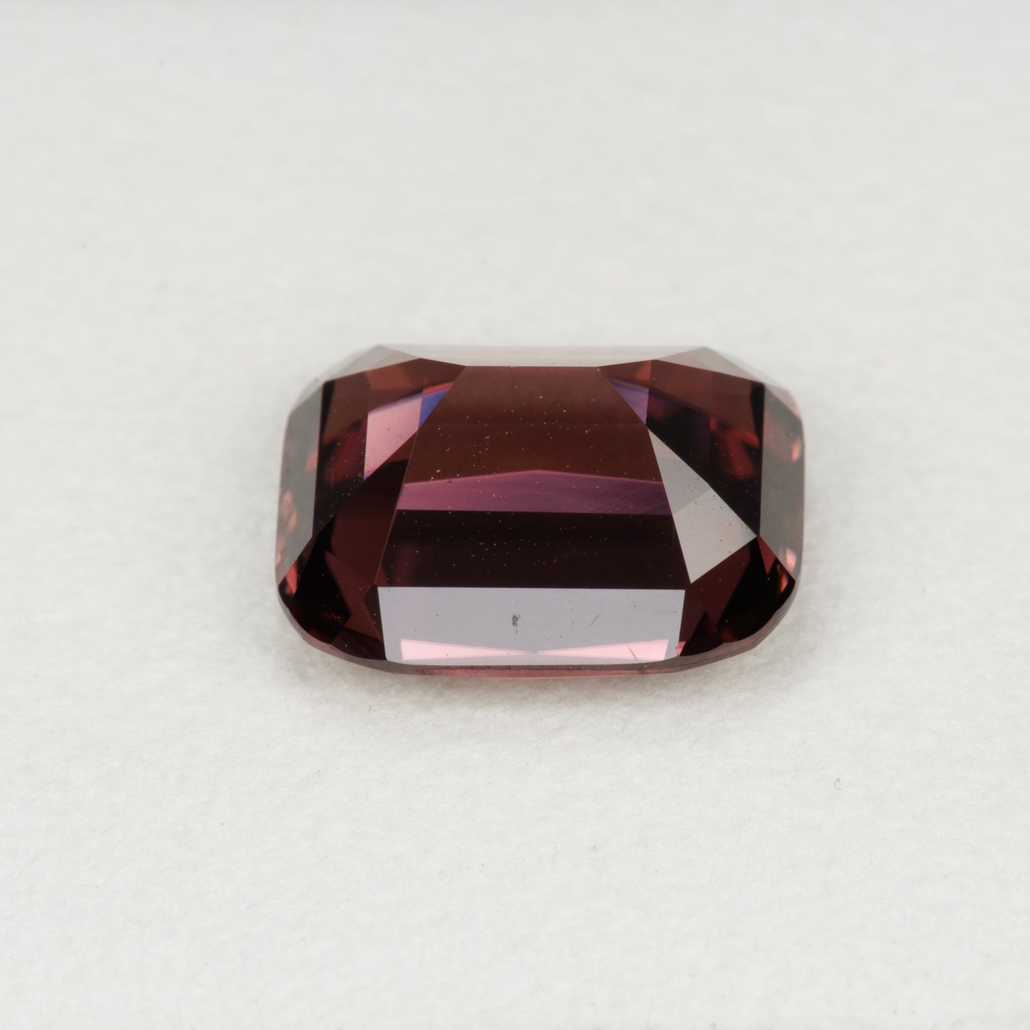 7.15 cts, Faceted red zircon, cushion cut