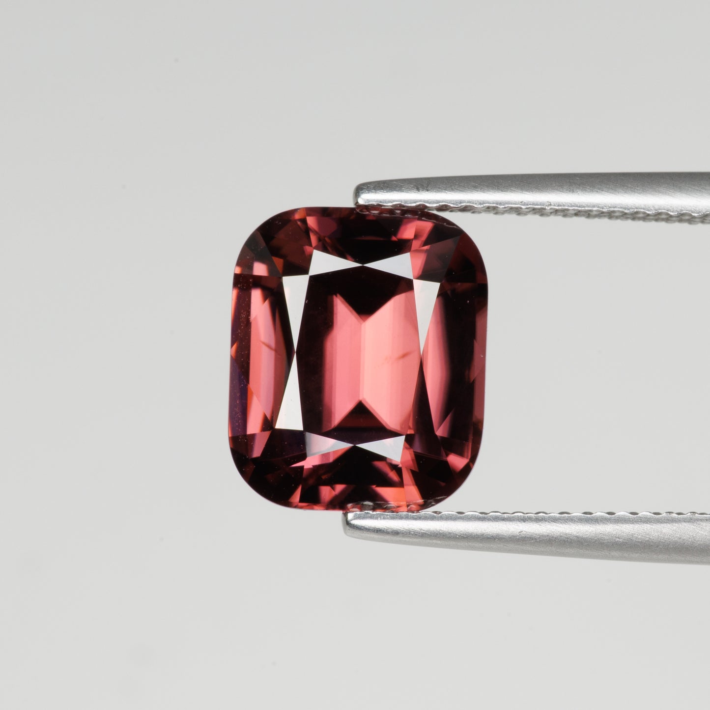 7.15 cts, Faceted red zircon, cushion cut