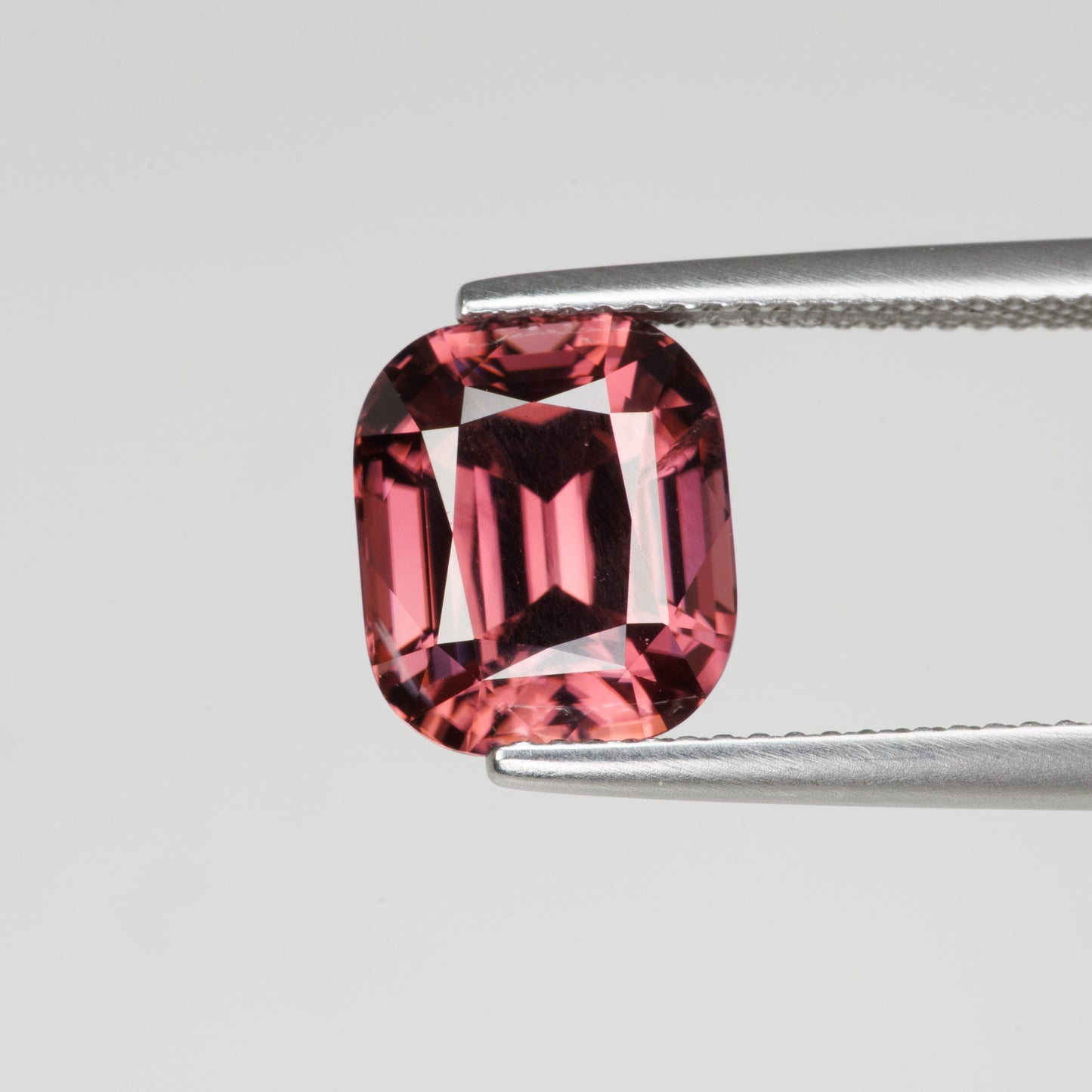 7.29 cts, Faceted red zircon, cushion cut